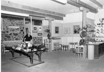 Buzz Ware in the Warehouse Gallery under Robin Hood Theatre, mid 20th century, ACSM01476.