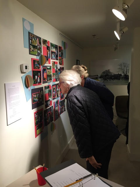 guests-looking-at-photo-collage_orig