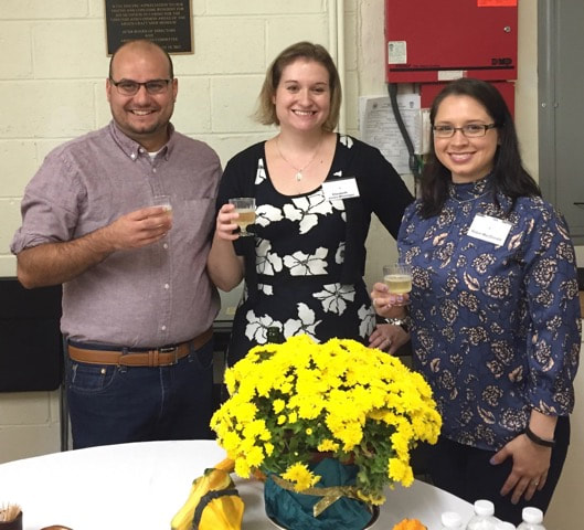 Curators past and present enjoy the opening.